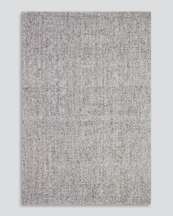 Nebraska Floor Rug in Ash, the whole rug shown flat on a plain background