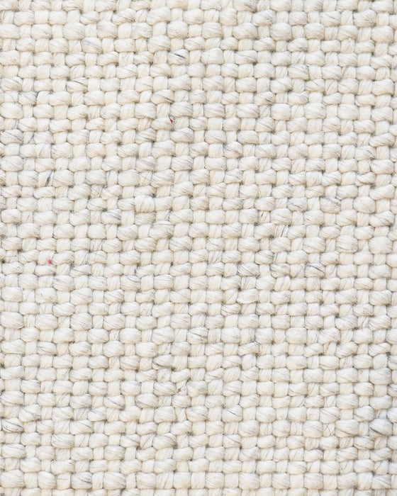 Nebraska Floor Rug in Natural White, close-up of the wool and viscose pile and texture
