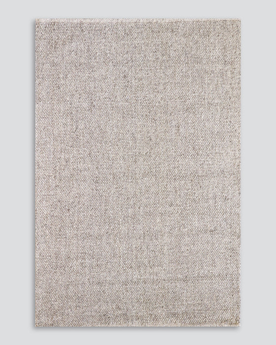 Nebraska Floor Rug in Pebble, the whole rug shown flat on a plain background