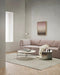 Clifton Floor Rug in Ash, styled in a living room with a pink sofa and round coffee table