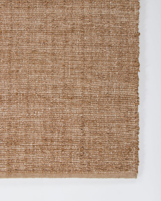 Ormond Floor Rug in Biscotti, close-up of a corner showing the edge and recycled PET pile