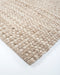Pelorus Floor Rug in Sand, close-up of a corner showing the edge and recycled PET pile