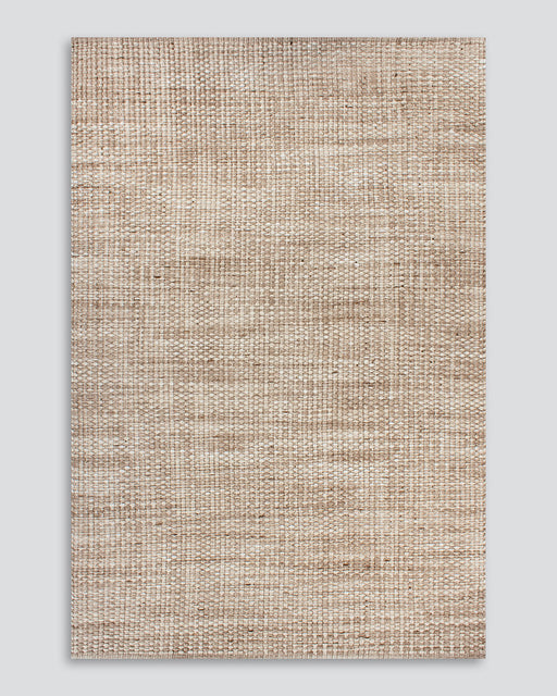 Pelorus Floor Rug in Sand, the whole rug shown flat on a plain background