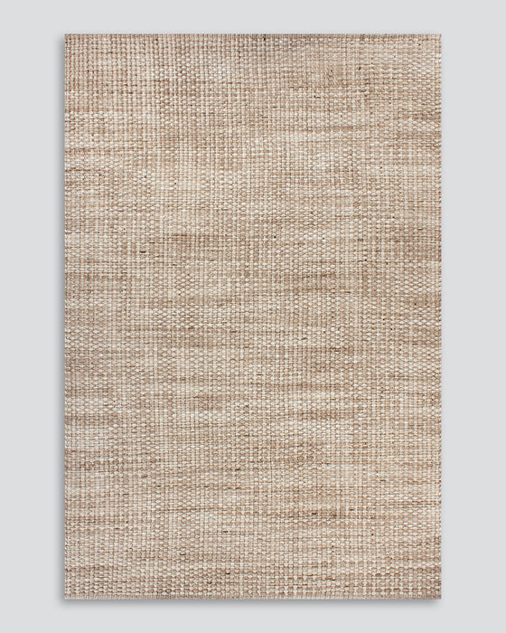 Pelorus Floor Rug in Sand, the whole rug shown flat on a plain background