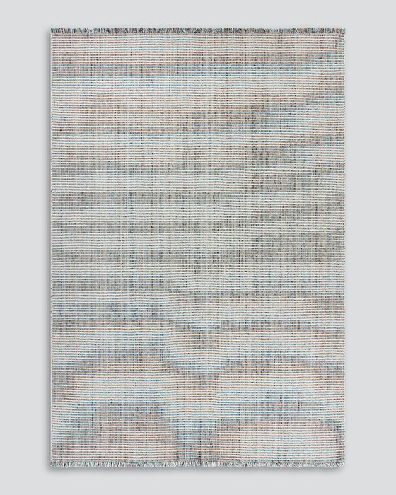 Rhodes Floor Rug in Slate, the whole rug shown flat on a plain background