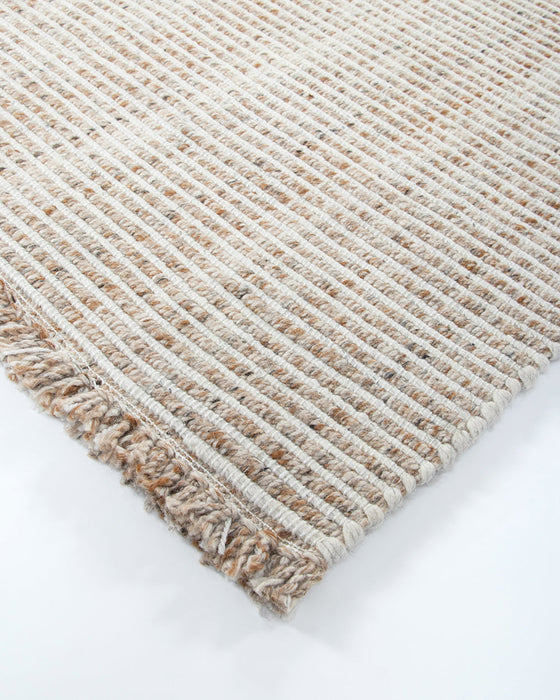 Rhodes Floor Rug in Teak, close-up of a corner showing the edge and recycled PET pile