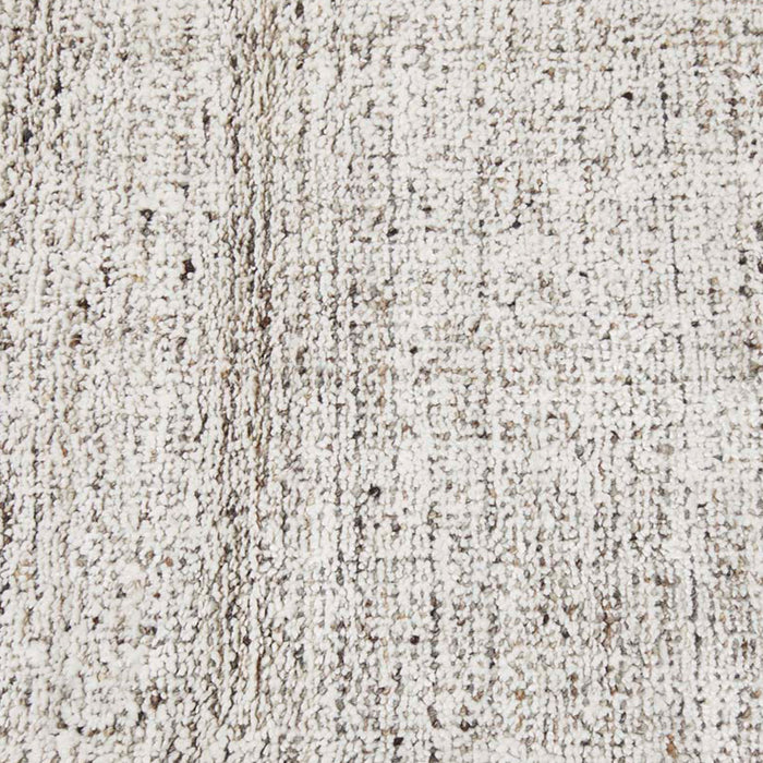 Tepih Dune Rug in Oatmeal, close-up of the flecked weave