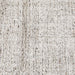 Tepih Dune Rug in Oatmeal, close-up of the flecked weave