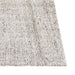 Tepih Dune Rug in Oatmeal, close-up of the corner and flecked weave