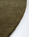 Sandringham Round Floor Rug in Moss, close-up of the curved edge and wool weave