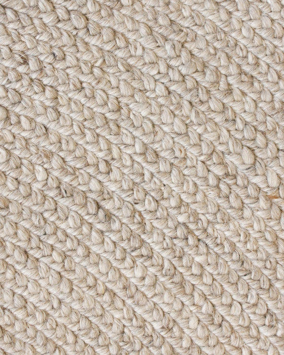 Tairua Round Floor Rug in Natural Straw, close-up of the wool and viscose pile and texture