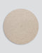 Tairua Round Floor Rug in Natural Straw, the whole round rug shown flat on a plain background