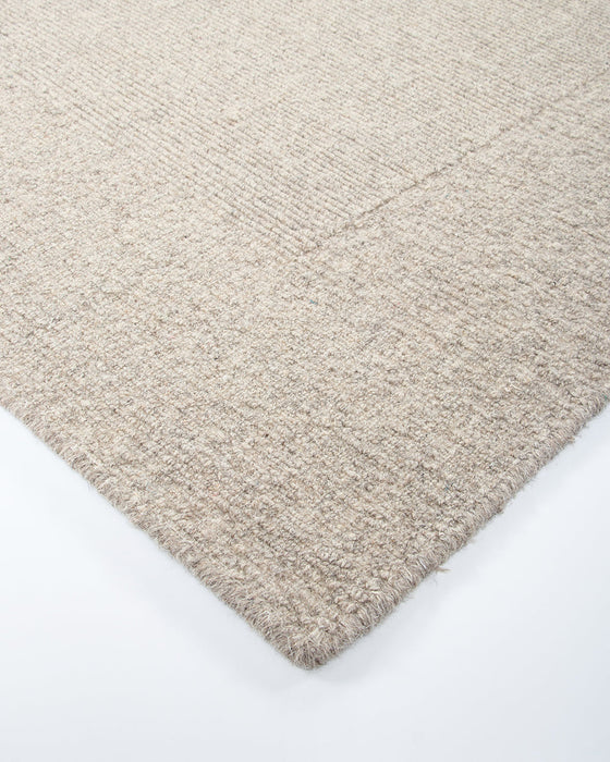 Vermont Floor Rug in Driftwood, close-up of a corner showing the edge and wool pile