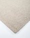 Vermont Floor Rug in Driftwood, close-up of a corner showing the edge and wool pile