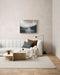 Vermont Floor Rug in Driftwood, in a living room with a white channelled sofa and stone coffee table